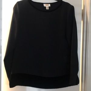 Evening wear top. Black polyester/rayon with velvet trim.